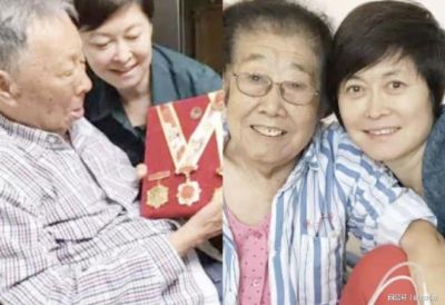 敬一丹全家福，一家人亲密依偎，脸上流露笑意，氛围温馨和睦